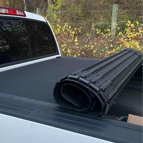 Hard rolling truckbed cover